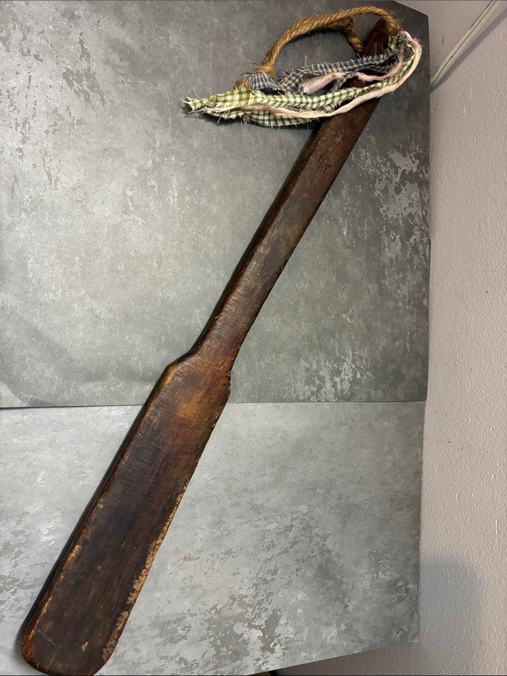 Rustic Brown Wooden Paddle Wall Accent with Fabric Tassel